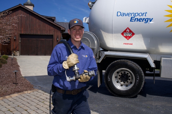 Davenport Energy propane truck and staff delivering propane