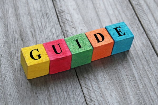 GUIDE spelled using colorful wooden letters depicting Propane Guidance for New Users