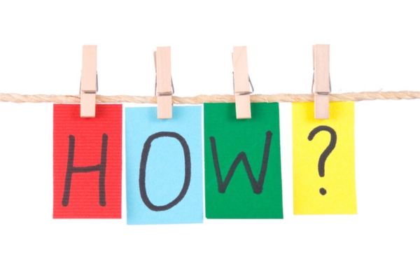 How spelled using letters on colored papers hanging on thin rope