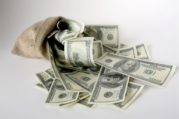 jute bag with dollar bills depicting Cost-Efficient Heat Output