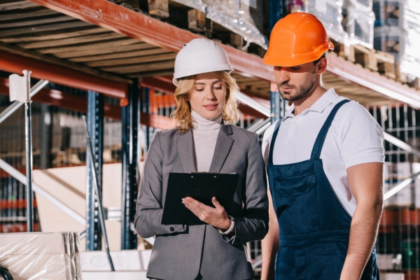 manager and worker assessing Current Propane Consumption
