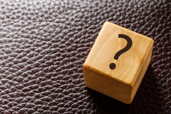 question mark on a wooden cube depicting Commercial Fuel Tank FAQs