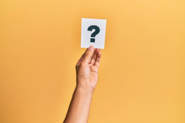 question mark on paper held up by a person's hand depicting Propane Tips FAQs
