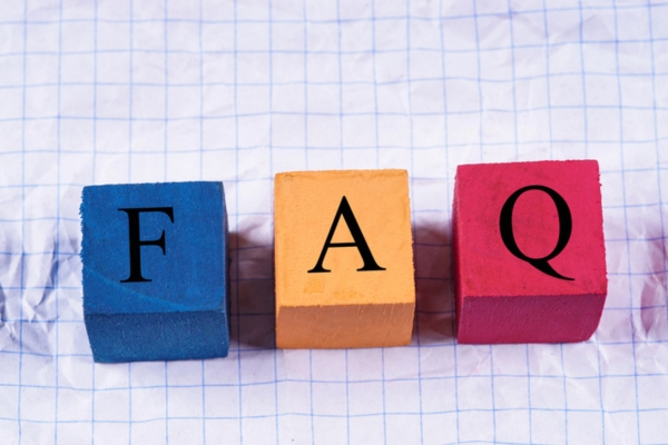 FAQ spelled using colorful wooden letter cubes depicting Questions About Oil Heating Costs