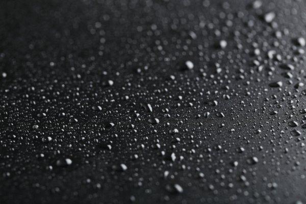 water drops on metal surface depicting condensation