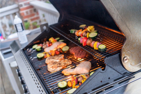 propane powered grill at the backyard
